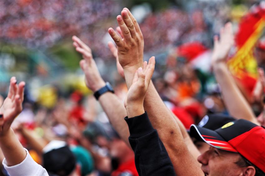 F1 fans waving
